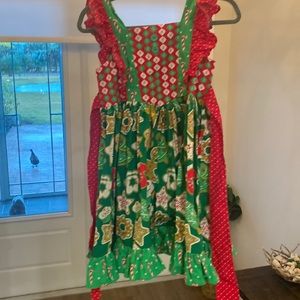 Eleanor Rose Christmas dress never worn. Size 10 - 12. Sweet treats pattern.
